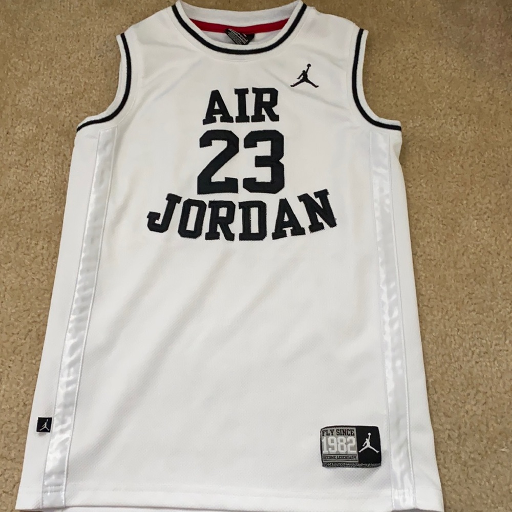 White w/black lettering Kid’s Jordan Jersey size L